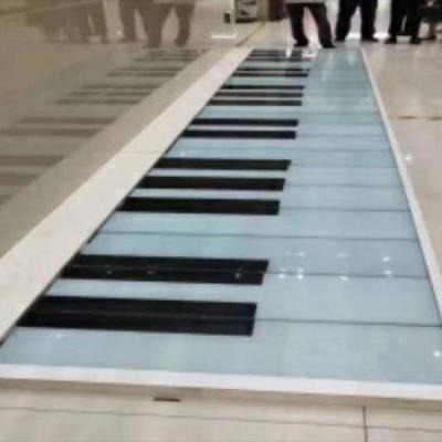 China Commercial piano keyboard floor outdoor plastic floor tile LED interactive Dance Floor for sale