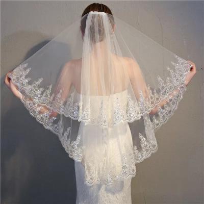 China Elegant lace edge fashion bridal veil sequin lace up white double veil style short head wear with hair comb for sale