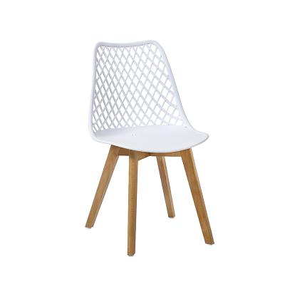 China Nordic Home Furniture Cooling Plastic Chair With Wooden Legs Modern Dining Chairs for sale