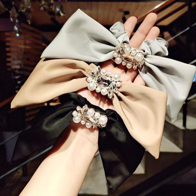 China Hair Silk High Quality Elegant Band Scarf Bowknot Pearl Bowknot Pearl Tie Female Hair Ring Accessories for sale