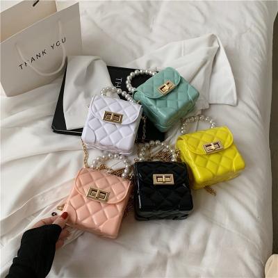 China Trendy Joyie Diamond Pattern Jelly Purse Kids Messenger Bags Bags For Girls Top Fashion Mini Handbags 2021 Pearl Chain Cross - Body Bag for sale