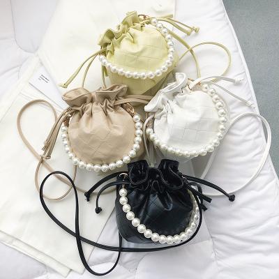 China Fashionable Messenger Bags JOYIE Solid Color PU Leather Bucket Bag Pearl Strap Mini Handbag Drawstring Quilted Purses 2021 Women Cross - Body Handbags for sale