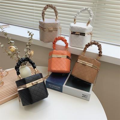 China 2021 PU Leather Bag JOYIE Autumn New Fashion Small Bucket Orange Color Clutch Handbag Ladies Ruffle Stitched Handle Handbags For Women for sale