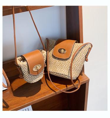 China Fashionable Messenger Bags 2021 New Mini Tote Bag Women Handbags Mommy and Me Straw Beach Bag Small Bucket Summer Fashion Purses for sale