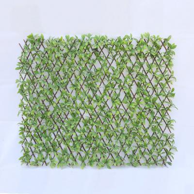 China Easily Assembled Green Wall Decoration Artificial Plant Leaves Grass Fence Artificial Fence Greenery for sale