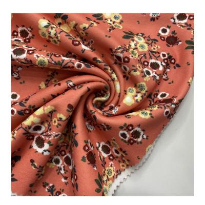 China Viable New Arrival Hot Sale Wholesale Brown Flowers Digital Printing Brushed Dralon Fabric For Garments for sale