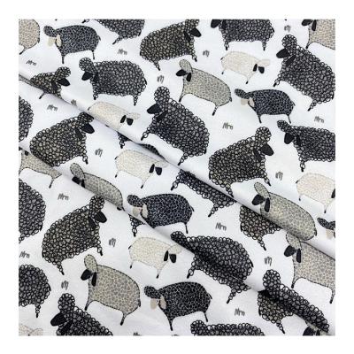 China 2022 New Arrival Viable Colored Cartoon Milk Silk Polyester Digital Printed Fabric For Kids Clothes for sale