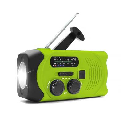 China PORTABLE solar emergency dynamo mini hand crank am portable fm radio with flashlight for sale