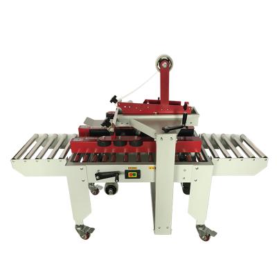 China FXJ-4030 left and right drive case sealer machine, automatic band sealing machine for sale