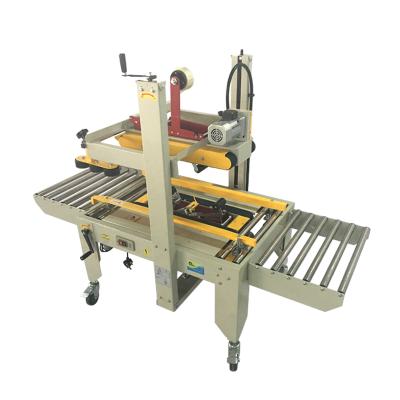 China FXJ-6050 Automatic Food Strip Sealing Machine Driven Thru / Box Sealing Machine for sale