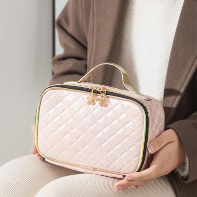 China Durable Customized Fashion Gold Accent Logo Gold Stamping Vegan Leather Cosmetics Bags With Metal Zipper Makeup Pouches Wholesale for sale