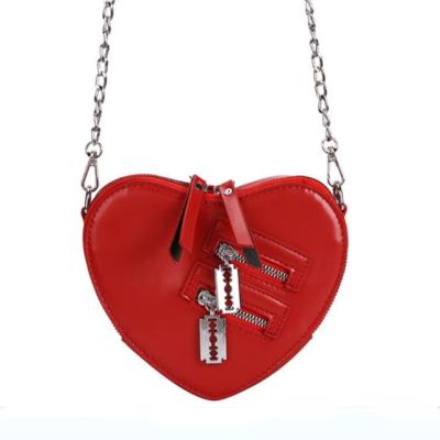 China New fashion style waterproof heart shape PU versipacks leather chain satchel for women for sale