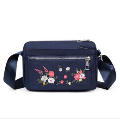 China New Style Factory Price Waterproof Embroidery Belt Nylon Messenger Bag Messenger Bag For Women for sale