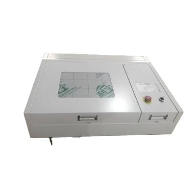 China - Glass used CO2 laser engraving machine to engrave small area artware for sale