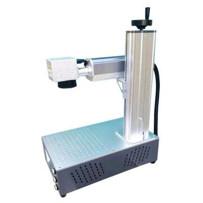 China Large Joint Fiber Laser Marking Machine Air Cooled Bottle Permanent Laser Marker For Jewelry Ring And Necklace for sale