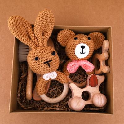 China Natural Eco-Friendly 8 Pcs Brush Baby Hair Comb Wooden Crochet Rabbit Bear Bell Rattle Teether Pacifier Chain Gift Set for sale