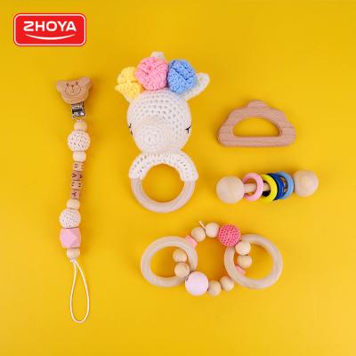 China 5 Pcs New Design Eco-Friendly Natural Wood Hook Animal Chain Unicorn Rattle Teether Baby Pacifier Chain Gift Box for sale