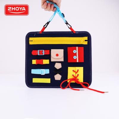 China Educational Montessori Educational Book Toys Felt Board Diy Busy Children Learning To Dress Busy Basic Skills Book for sale