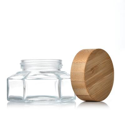 China 15g,30g,50g Hexagonal Clear Empty Glass Cosmetic Packaging Cream Jar Body Cream Jar With Bamboo Lid for sale