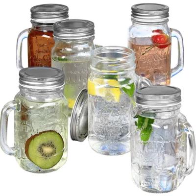 China 16 Ounce Clear Glass Bottle Square Food Shape Mason Jar Mugs With Handle And Glass Lids For Drinking for sale