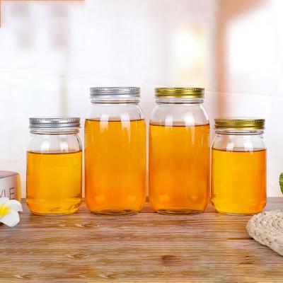 China 16oz Food Round Glass Canning Honey Sugar Glass Jar Mason Jar Clear Glass Jam Shape Food Storage Container for sale