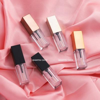 China OEM Chinese 3ml cosmetic square black matte black metallic gold rose tube containers empty gold lip gloss plastic bottles for sale