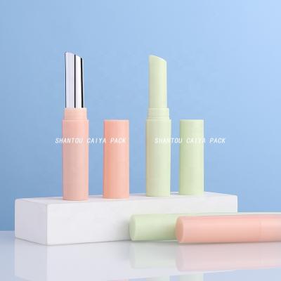 China Fashionable Plastic Makeup Packaging Lip Care Gold Matte Black Round Slim Nude Green Lipstick Tube Empty Lip Balm Container Custom for sale