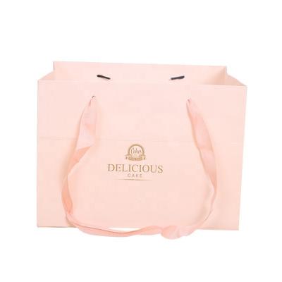 China Factory direct sales recycled materials and various sizes gift custom printed shopping bag decorative wedding paper bags with ribbon for sale