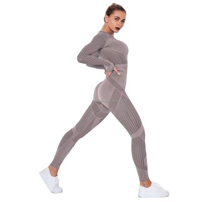 China Sets 2021 Europe and the United States Yoga Wear Body Seamless Quick Dry Hip Exercise Clothes Tight Stripe Hollow Out Fitness Pants TW for sale