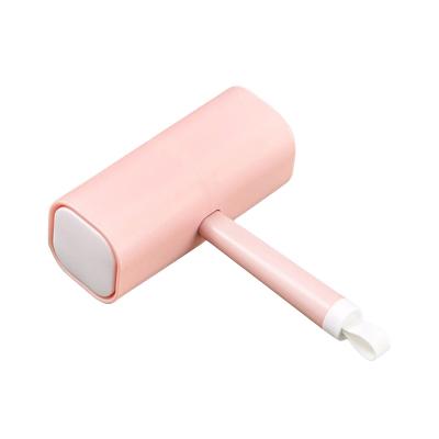 China Small and exquisite for easy storage high quality tearable with dust cover household clothing roller hair removal device for sale