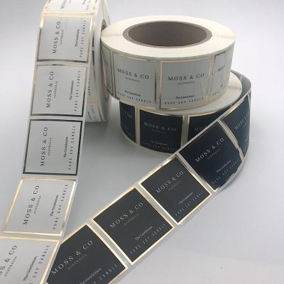 China Custom Waterproof Glossy Self Adhesive Gold Foil Stickers Waterproof Printing Paper Black Labels for sale