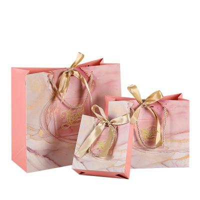 China Recyclable Pink Marble Thank You Gift Bag Small Foldable Paper Wedding Gift Packaging Luxury Shopping Bag for sale