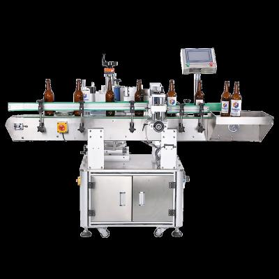 China Beverage Round Bottle Automatic Standing Rotating Labeling Machine for sale