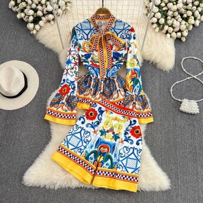 China Fashion Flared Long-Sleeved Printed Tucked Waist Peplum Shirt Two-Piece Shorts Suit for sale