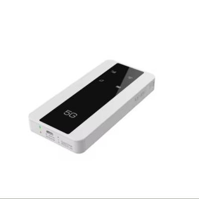 Cina 2024 New Style White Mini Wifi Portable Wifi Router 5g Lte Sim Card 5g Router Home Cpe And As A Power Bank in vendita