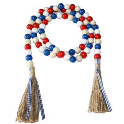 China New Rustic Multi Size Red and Blue Wooden Bead Garland for 4th of July Patriotic Decor for sale