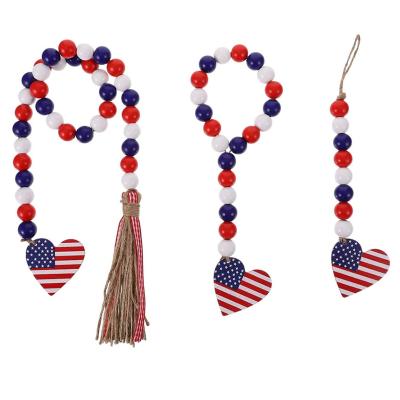 China 100% Handmade Colorful Wood Bead Tassel Garland Hemp Rope Ribbon Independence Day Jewelry Home Decors for sale