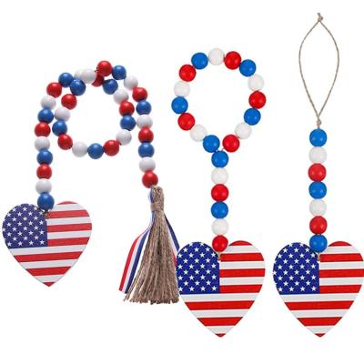 China Wooden Bead Garland Decor With American Flag Rustic Patriotic Independence Day Tag for sale