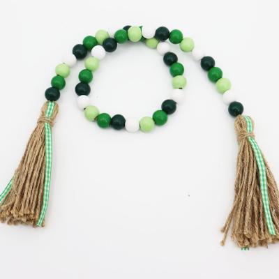 China Lreland String Tassel Decoration Hemp Hanging Rope Felt St Patrick's Day Wooden Bead for sale