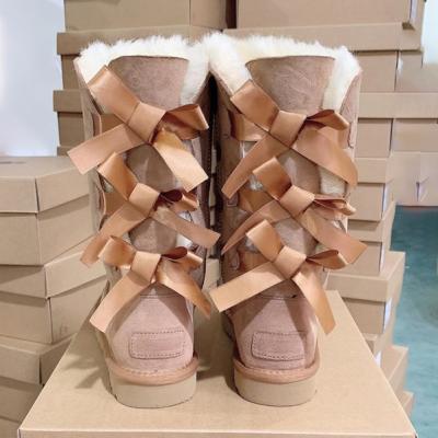 China Fashion Trend Drop Shipping 2021 New Wool Sheepskin Women's Faux Stone Fur Snow Boots Warm Winter Boots Uggh Boots For Women for sale