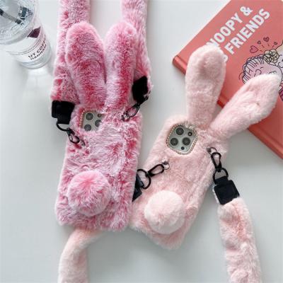 China Anti-fall winter plush lanyard rabbit ears for iphone 13, furry cell phone case for iphone 13 pro max for sale