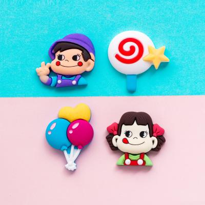 China Europe Cute Boys And Girls Balloon Lollipop Resin Accessories Cartoon Flatback Resin Cabochon For DIY for sale