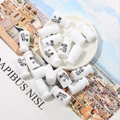 China Europe Hot Selling Milk Bottle Resin Cabochons Accessories Cute Three-Dimensional Diy Jewelry Decoration for sale