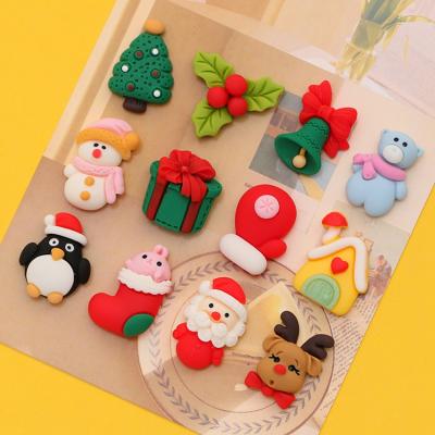 China Europe Christmas Kawaii Flatback Wholesale Resin Cabochons Assorted Resin Christmas Decoration Mud Charm Craft Holiday Booths for sale