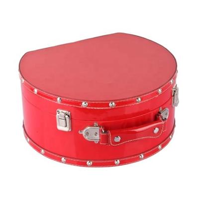 China Red classic decorative design round suitcase for travel and jewelry for sale