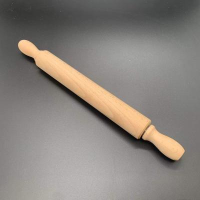 China Rolling Pin Wholesale Engraved Beech Wooden Embossed Kitchen Tools Rolling Pin for sale