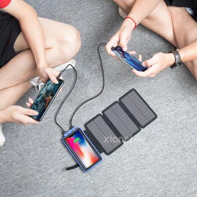 China Dual USB Solar Panel Charger 20000mah Wireless Fast Foldable Radio Battery LED Solar Power Bank OEM for sale