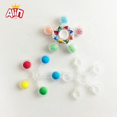 China Full Size Plastic Fingertip Gyro Toy With Five Pill Fruity Hard Candy for sale