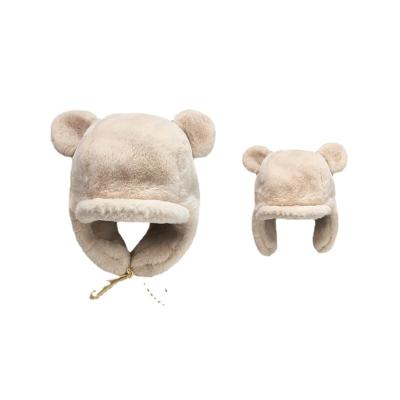 China Fashion factory wholesale winter hearing protection plush thickened earmuffs cute kids bear proof cold plush warm hat for sale