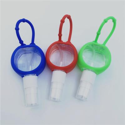 China Portable Europe Silicone Hand Sanitizer Holder Key Chain With 30ml Spray PET Bottle for sale